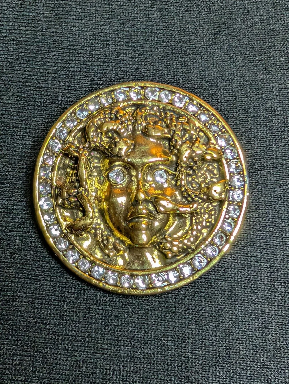 Gold Medusa-Style Round Pin with Rhinestone Border